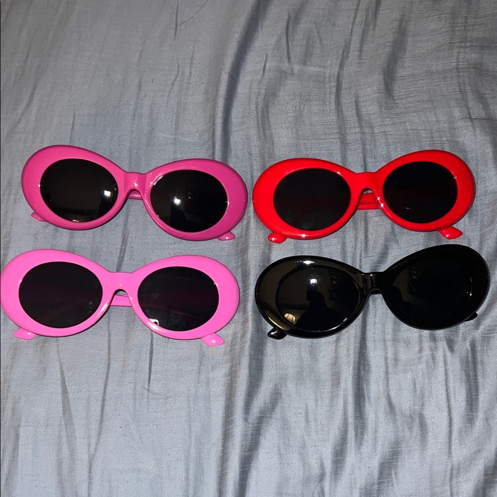 Set of Four Stylish Sunglasses in Pink, Red, and Black